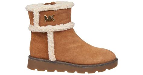 kors michael kors shearling boots|michael kors boots outlet.